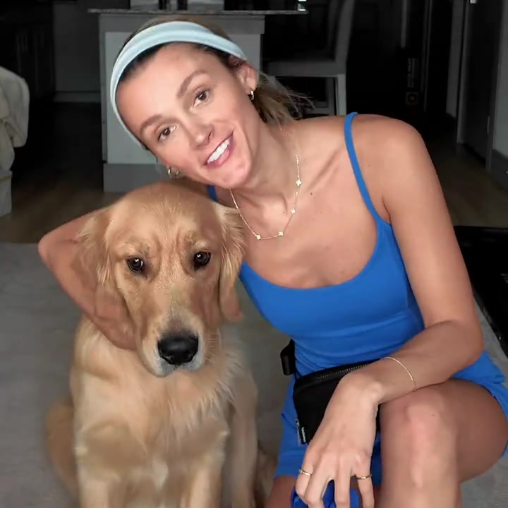 Allie smiling with her arm around River