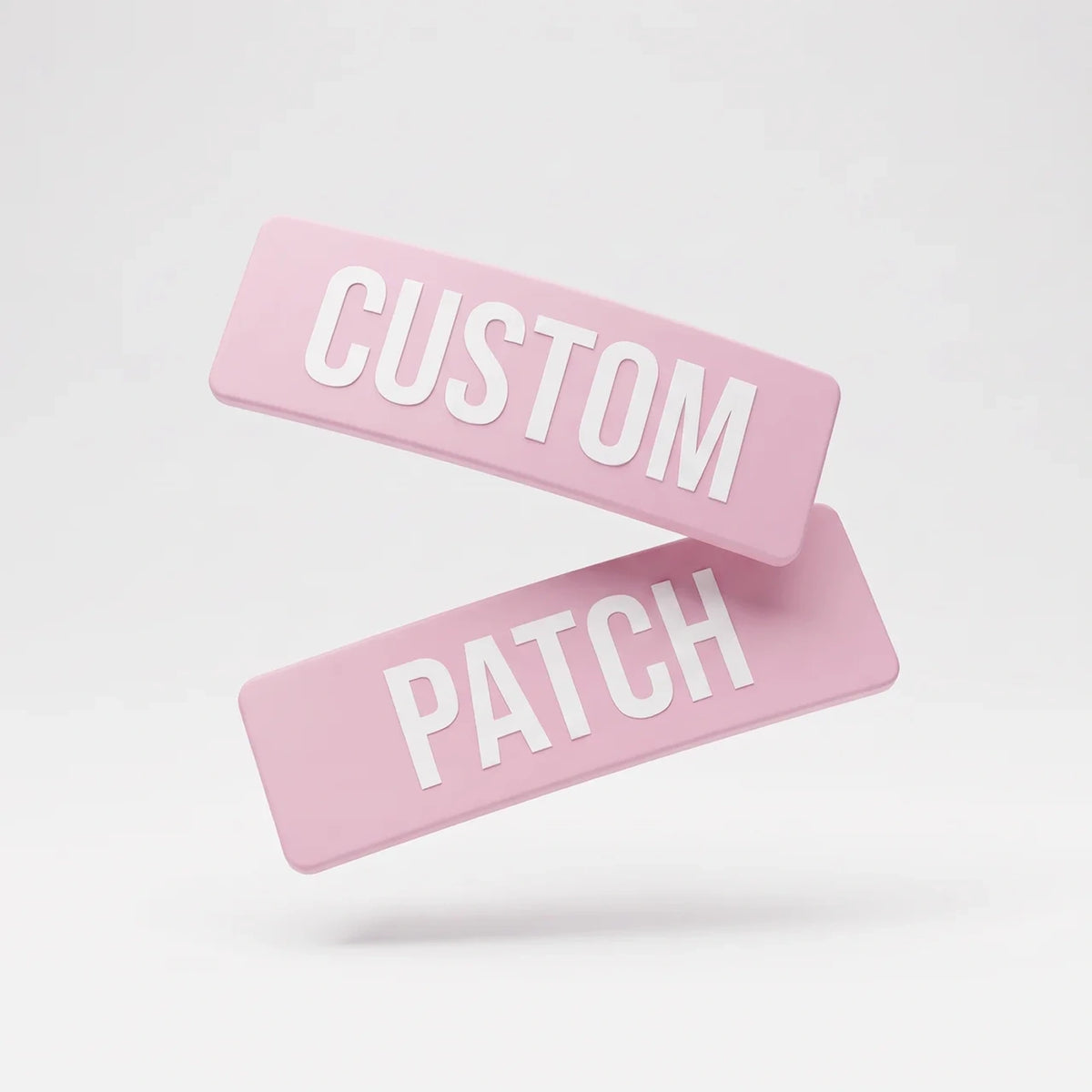Two custom name patches from the 7AM Club Limited Edition in Sakura (light pink), reading CUSTOM and PATCH