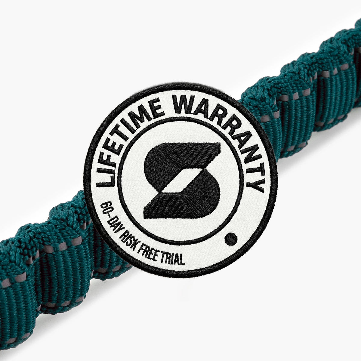 Lifetime Warranty, 60-day risk free trial badge over the Forest bungee leash