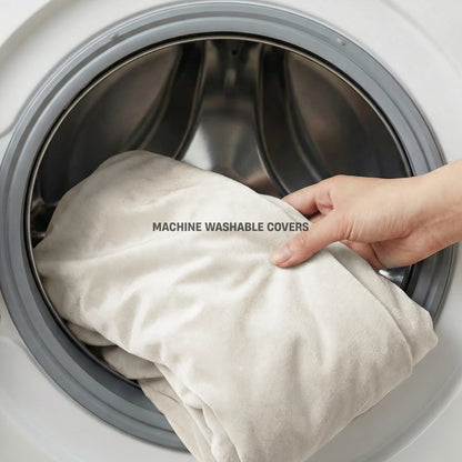Beige dog bed cover being placed into a washing machine with MACHINE WASHABLE COVERS label.