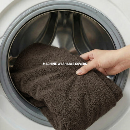 Brown Bouclé dog bed cover being removed for washing with MACHINE WASHABLE COVERS label.